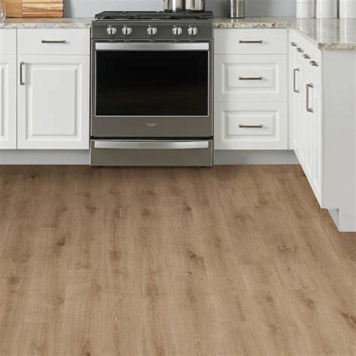 Can you put a refrigerator on laminate flooring?