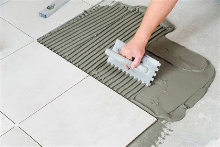 Can you use tile mortar to level a floor?