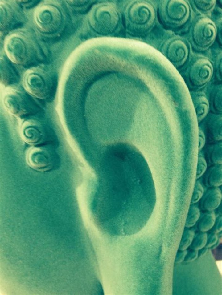 Did Buddha have stretched ears?