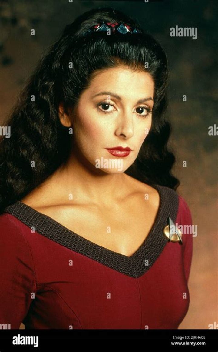 Did Marina Sirtis have breast enhancement?