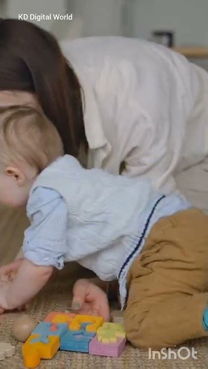 Do babies love their mom or dad more?