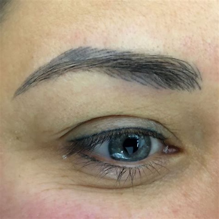 Do eyebrow tattoos fade completely?