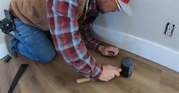 Do you have to remove baseboards to install vinyl flooring?