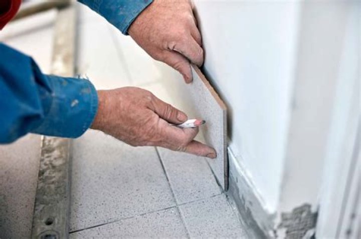 Do you leave a gap between tile and trim?