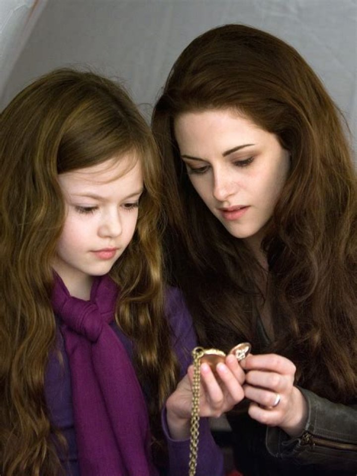 Does Charlie know Renesmee is his granddaughter?
