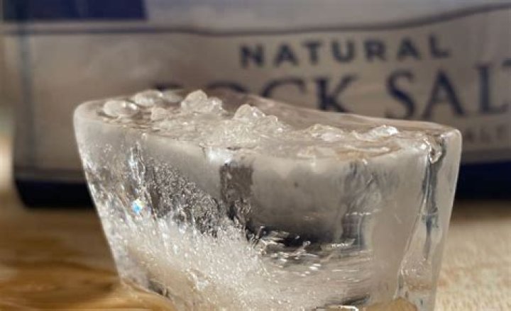 Does regular salt melt ice?