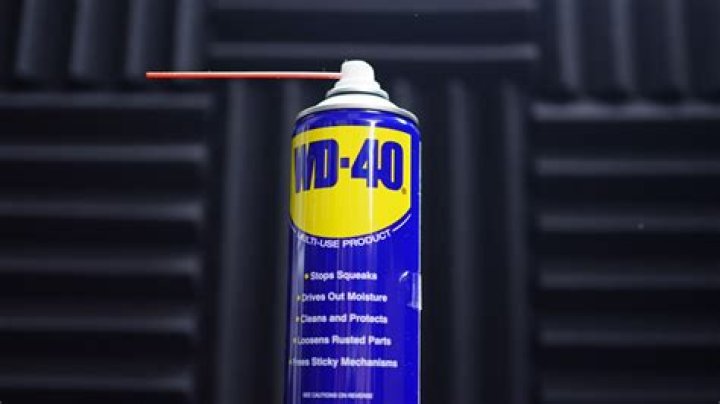 Does WD-40 remove adhesive from car paint?