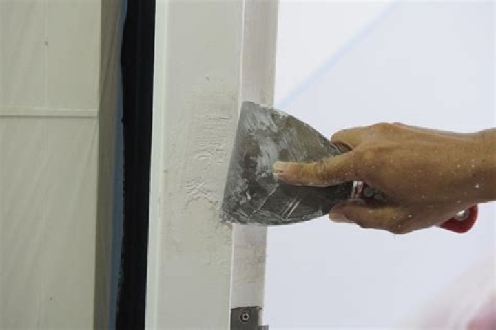 How do you fix peeling paint on a door frame?