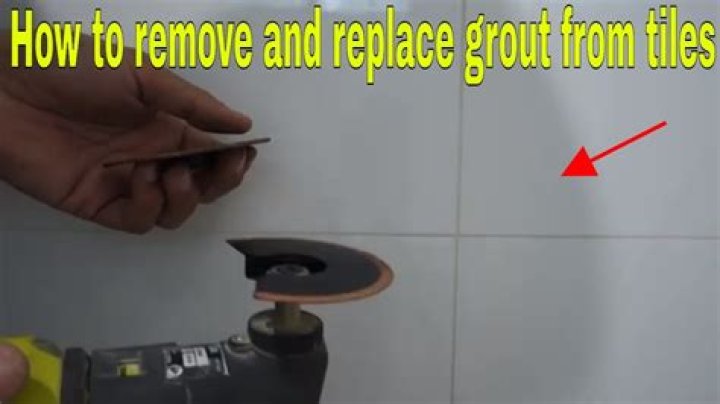 How do you get dried grout off of stone tile?