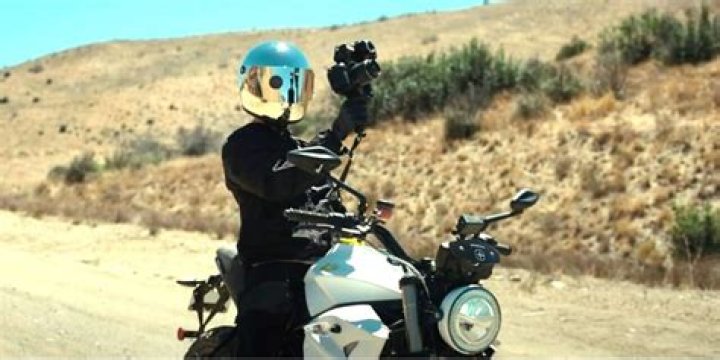 How do you hold a guy on a motorcycle?