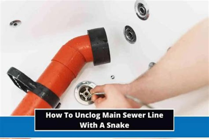 How do you unclog a main sewer line without a snake?