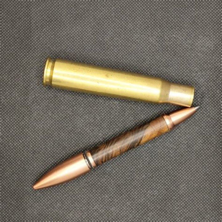 How far will a 50 cal bullet travel?