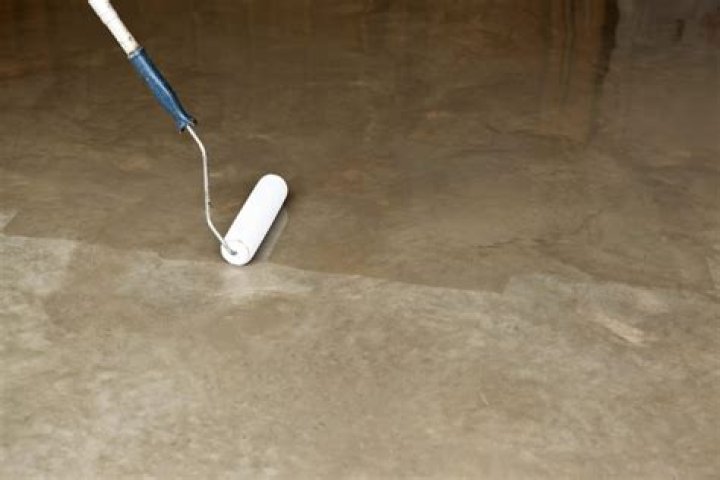 How long after applying concrete sealer can you walk on it?