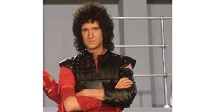 How tall is Brian May?