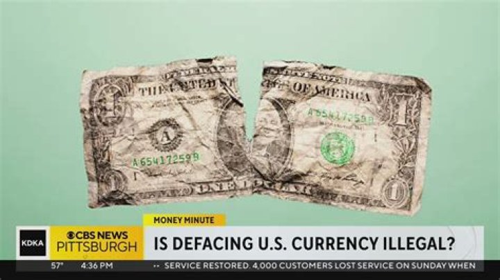 Is cutting up a dollar bill illegal?