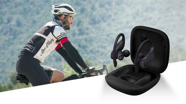 Is it illegal to wear headphones while riding a bike UK?