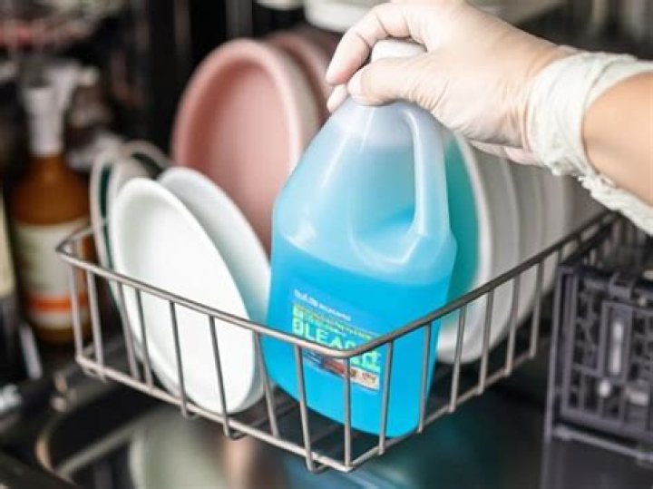 Is it OK to put bleach in dishwasher with dishes?