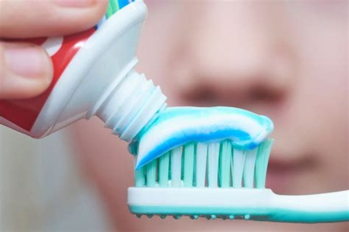 Should I rinse toothpaste with water?