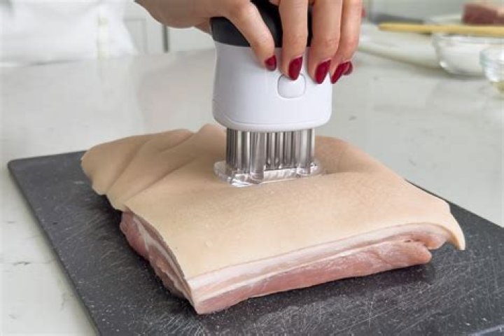 Should you poke holes in sausage before cooking?