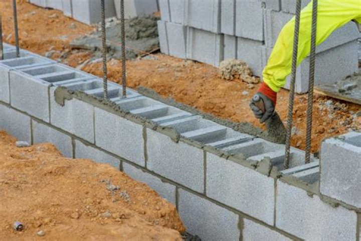 What are cored concrete blocks used for?
