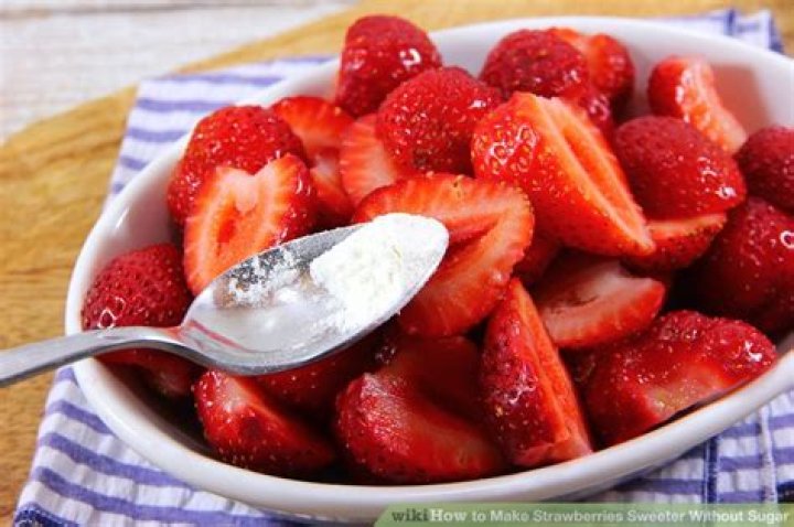 What can I add to soil to make strawberries sweeter?