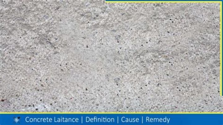 What causes laitance in concrete?
