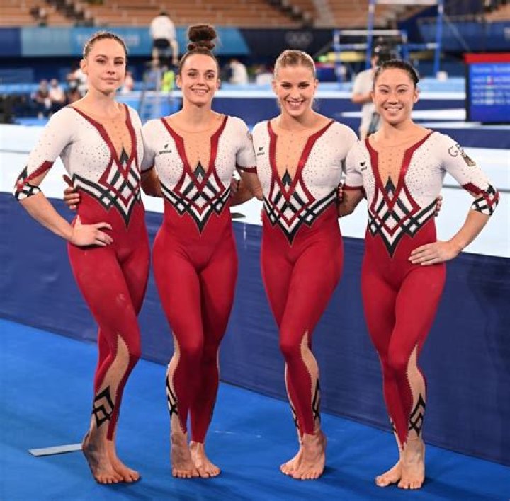 What do female gymnasts wear on their legs?