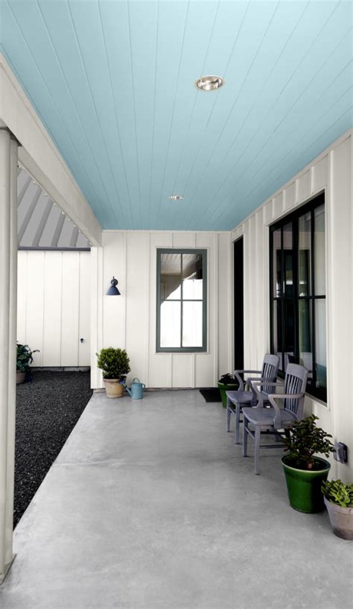 What does a blue painted porch mean?