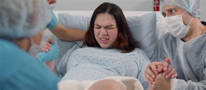 What does it look like when a baby is crowning?