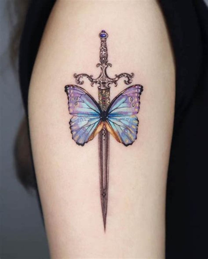What does sword through butterfly tattoo mean?