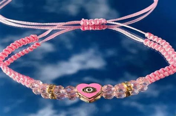What does the pink eye bracelet mean?