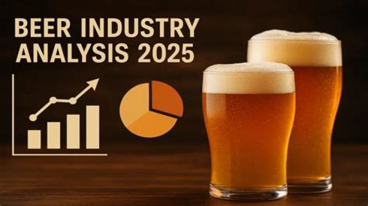 What firm dominates the US beer industry?