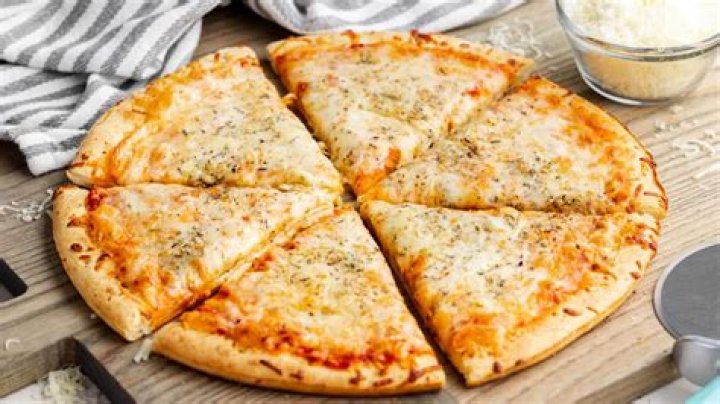 What goes first on pizza cheese or toppings?