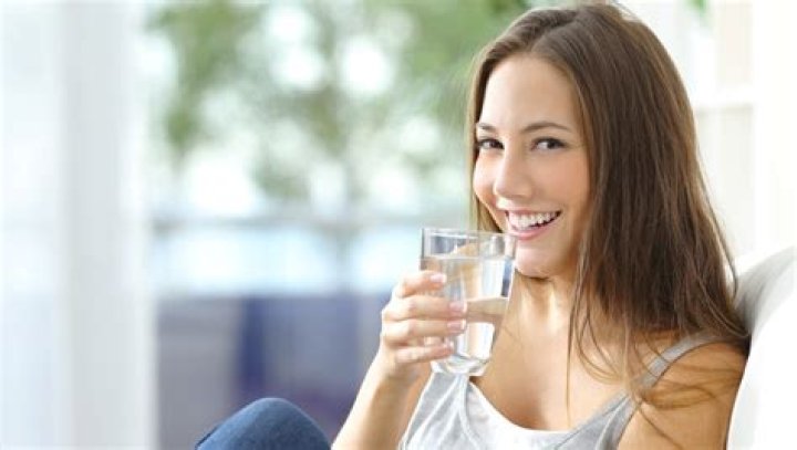 What happens when you drink water immediately after waking up?
