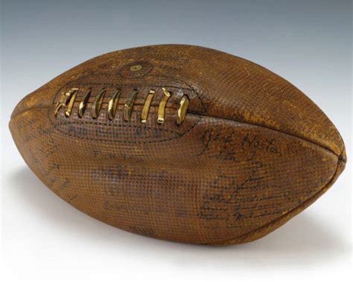 What were old footballs made of?
