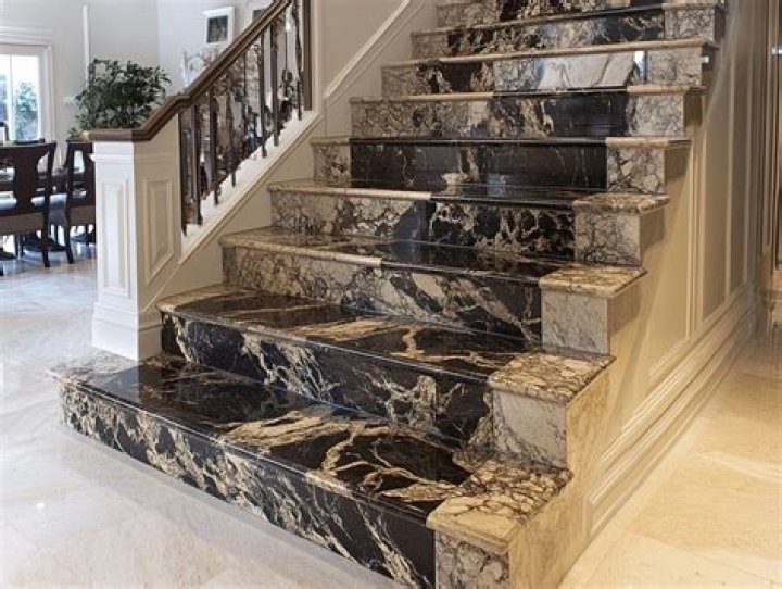 Which is costly granite or tiles?