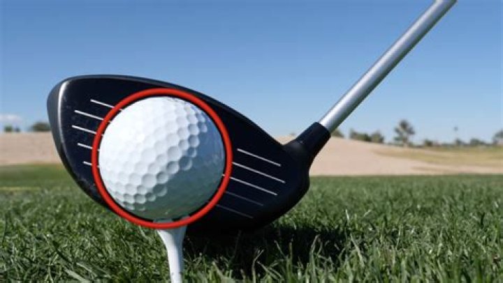 Which part of the golf club should contact the ball?