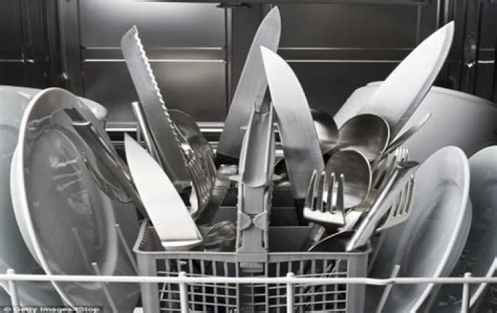 Which way do knives go in dishwasher?