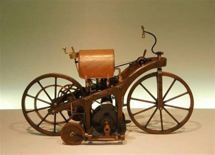 Who gets on a motorcycle first?