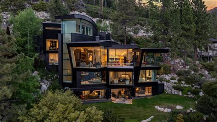 Who owned the 80 million dollar glass mansion?