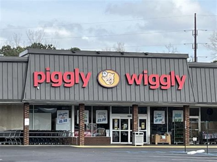 Who owns Piggly Wiggly grocery stores?