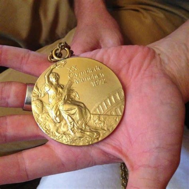 Who pays for a gold medal?