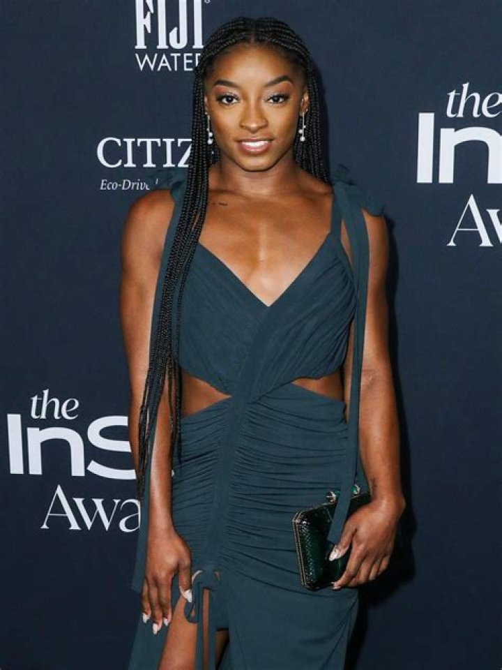 Why didn t Simone Biles compete in 2021?