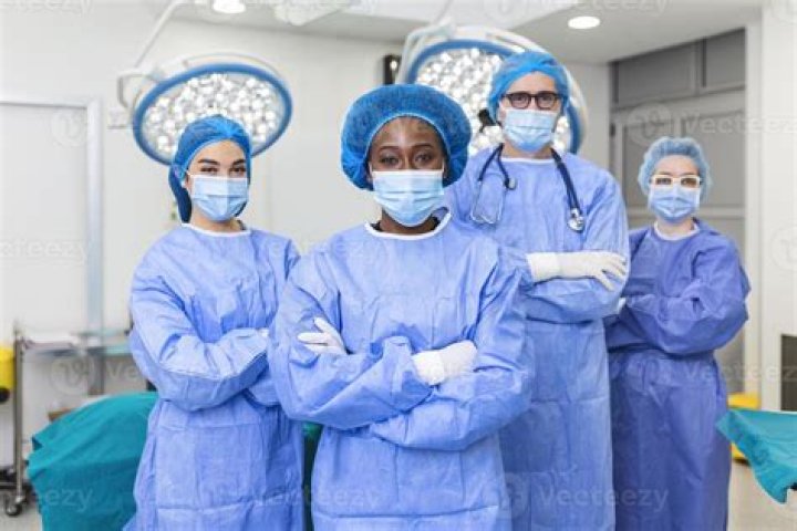 Why do doctors wear white clothes during surgery?
