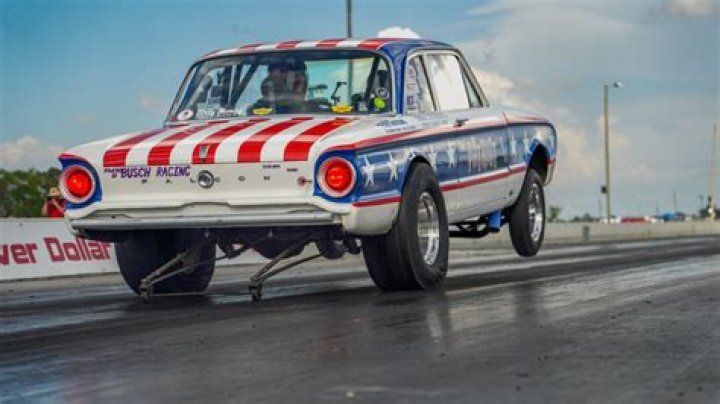 Why do drag cars have skinny front tires?