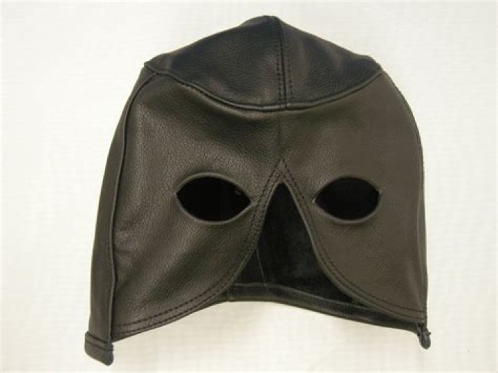 Why do executioners wear hoods?