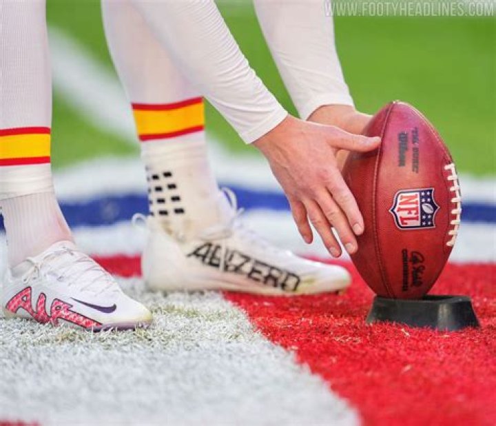 Why do football kickers wear two different shoes?