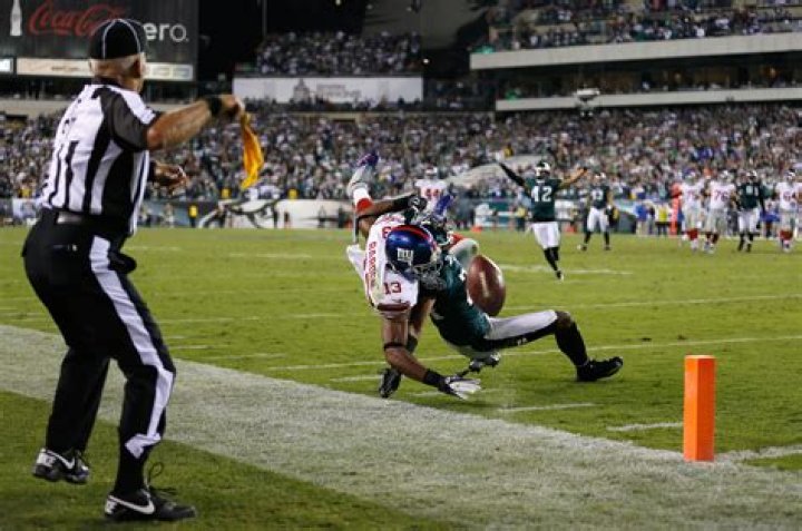 Why do NFL refs throw blue flags?