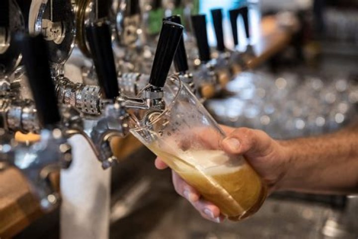 Why does beer taste better on tap?