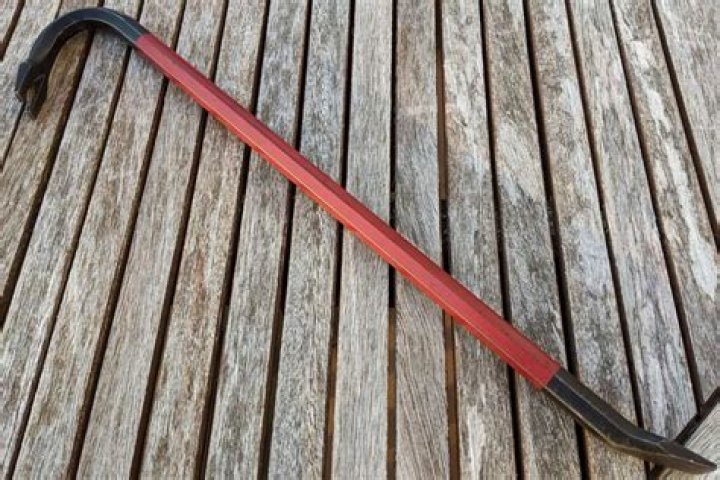 Why does Red Hood use a crowbar?